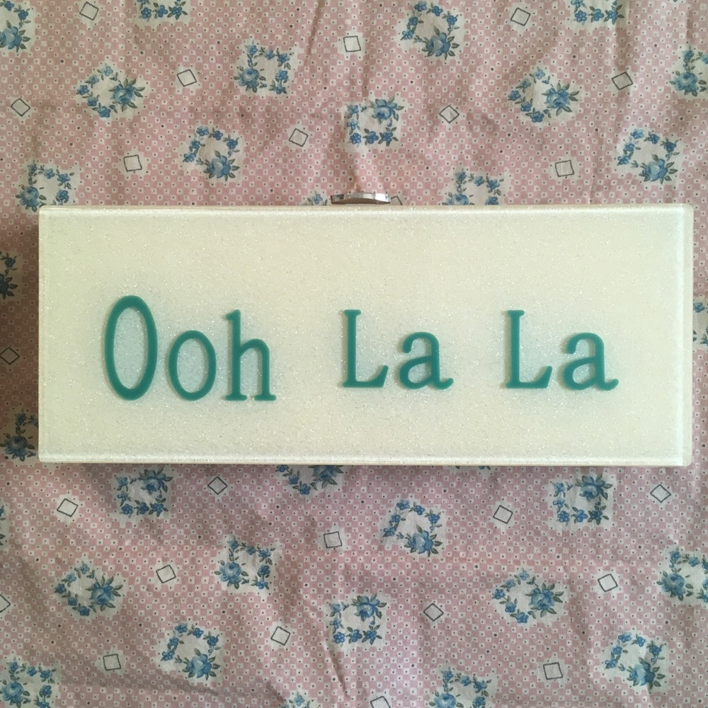 “Ooh La La” glitter acrylic clutch needs tlc